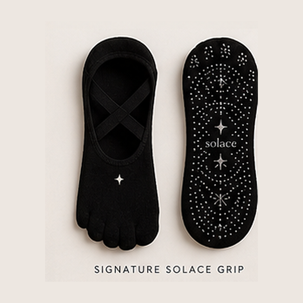 Black Solace grip sock pair
